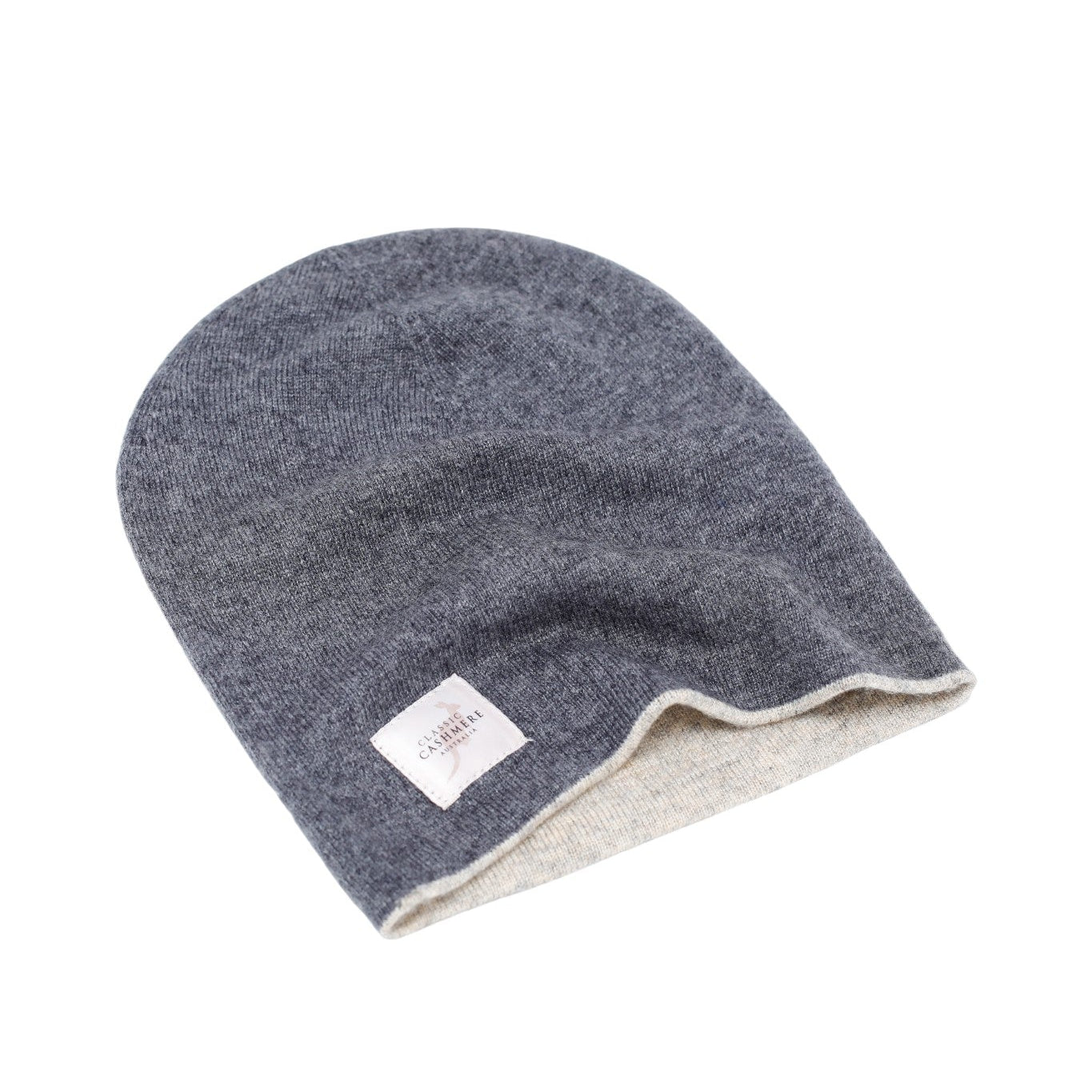 Gray knit beanie with a brand label on a white background