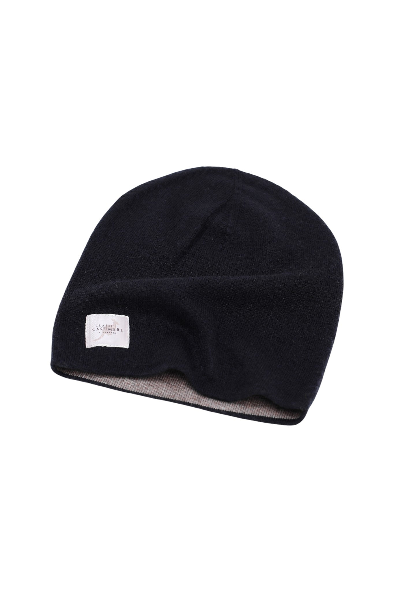Black beanie with a white label on a white background