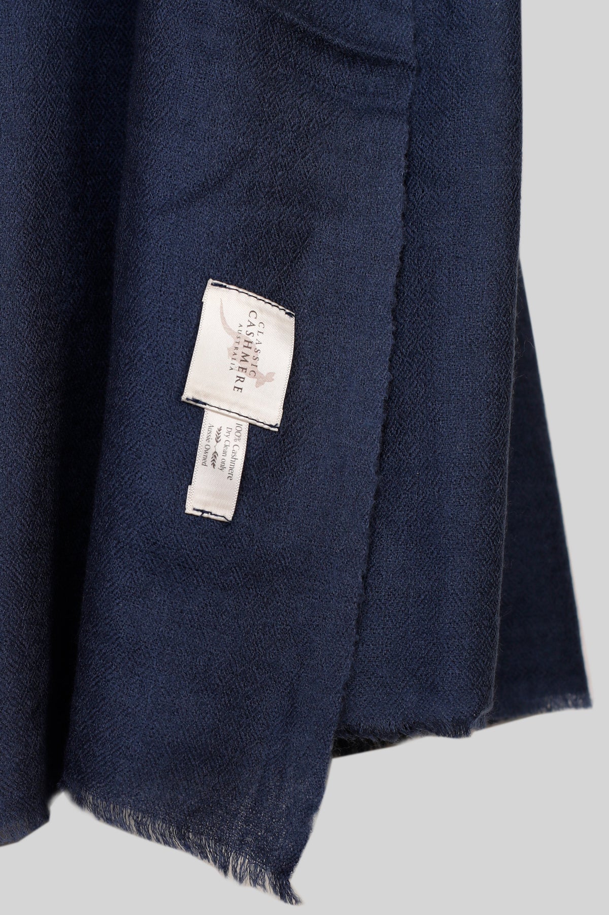 My Store navy blue lightweight 100% pure cashmere shawl with frayed edges and brand label detail