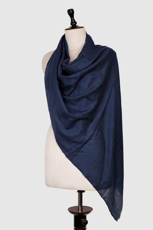 My Store navy blue lightweight 100% pure cashmere shawl draped elegantly on a mannequin