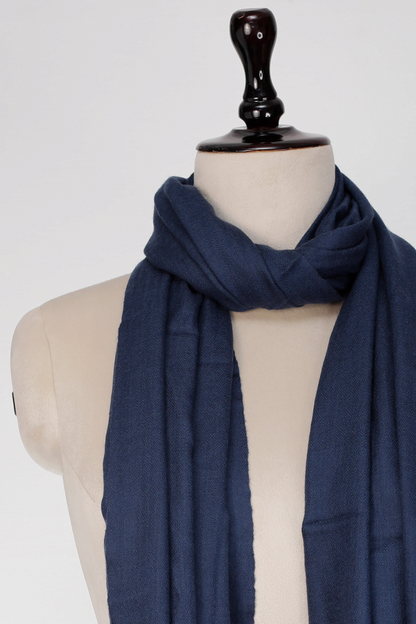 My Store navy blue lightweight 100% pure cashmere shawl draped elegantly on a mannequin